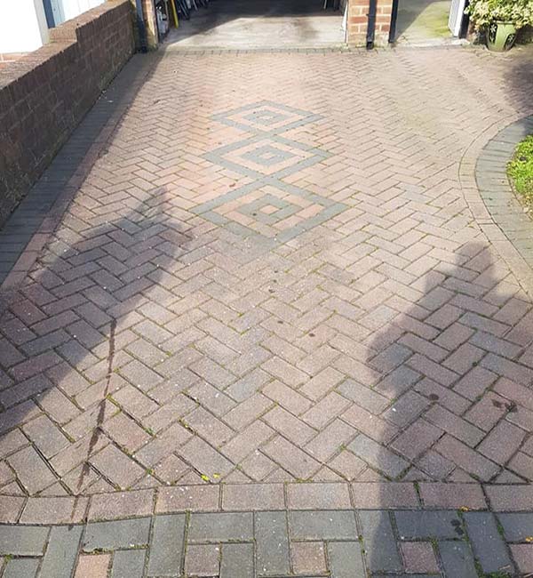 Block Paving Driveway pressure washing service before picture by revive-a-drive lancashire operating in blackpool, preston, poulton, the surrounding area and beyond - small