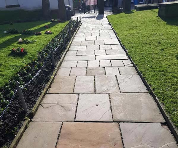 St Chads Church Poulton Pathway pressure washing service results by revive-a-drive lancashire operating in blackpool, preston, poulton, the surrounding area and beyond